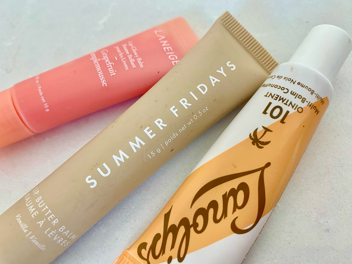 4 Lip Balms Compared: Glossier Bomb Dot Com vs. Laneige Glossy Balm vs. Lanolips Lip Balm vs. Summer Fridays Lip Butter Balm